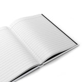 Hardcover journal showcasing lined pages