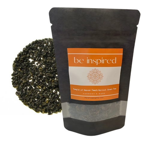 Be Inspired Peach Apricot Gunpowder Green Tea leaves in a jar.