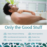 Man enjoying a soothing soak with Man Bath Infusion in a stylish bathtub.