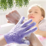 A person using the exfoliating gloves while enjoying a shower.