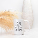 One Step At a Time Deluxe Mug in white ceramic