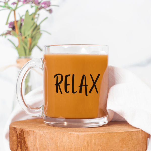 Relax Glass Mug holding warm beverage