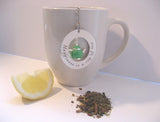 Stainless steel mesh tea ball with teapot charm